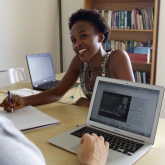 J-PAL Africa staff Palesa Thinta and Lloyd Belton review MicroMasters material in Cape Town, South Africa.